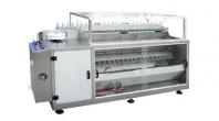 Rolling drum ultrasonic bottle washing machine